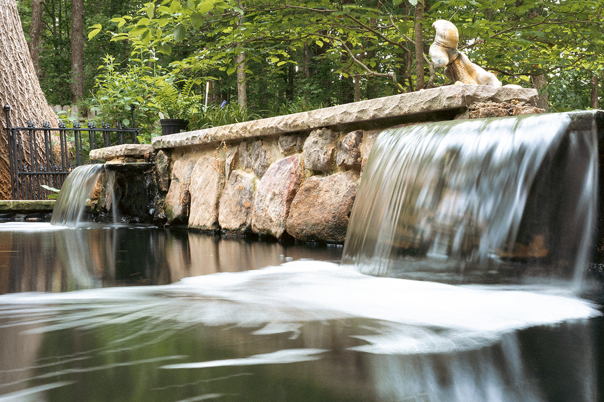 Beautiful double water feature at a 10,000 gallon pond